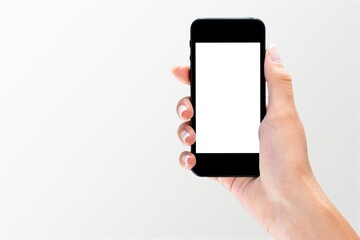 Hand holding the smartphone with blank screen