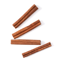 Cinnamon sticks isolated over white background closeup. Canella spice. Aromatic condiment background. Flat lay, top view.. - 519678844