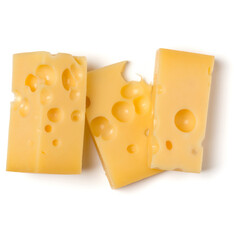 Top view of pieces of the Swiss cheese different sizes with large holes isolated on white background
