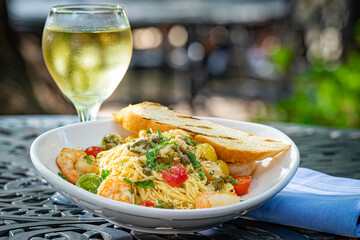 Shrimp Scampi Spaghetti, Butter Sauce and a Glass of White Wine.