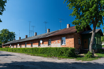 A long, red brick house, Staicele, Latvia.