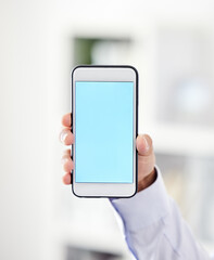 Business phone with blank screen or copy space for a website, marketing or advertising app. Closeup of man holding or showing copyspace on wireless handheld technology with corporate background