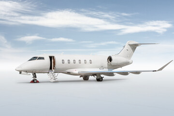 Modern white private jet with an opened gangway door isolated on bright background with sky