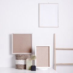 Mock up frames in white wall background, with home interior decoration, Scandi-Boho style.