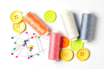 Accessories for sewing on a white background. Closeup.