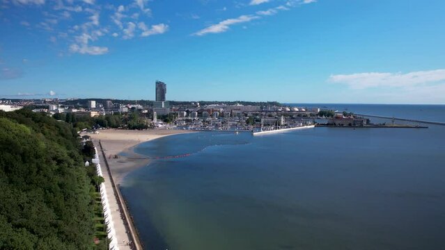 View From Feliks Nowowiejski Seaside Boulevard Of Gdynia Port And Modern Apartment Hotel In Gdynia, Poland. wide aerial