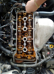 Close up of parts in engine head for adjust valve engine