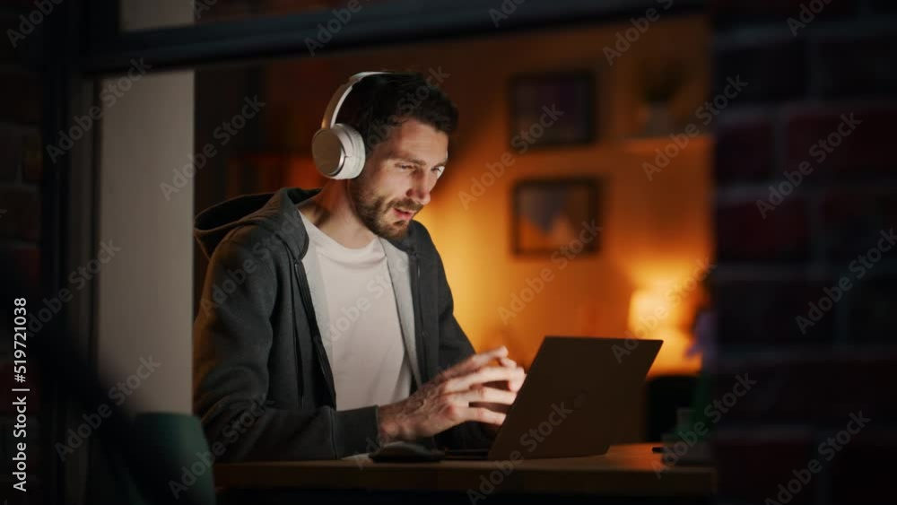 Poster Professional Software Developer Stretches and Continues to Work on Laptop, Writing Code and Finishing Application Project. Virtual Remote Work from Home. View From Outdoors into Window. Static Shot.