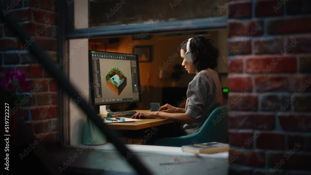 Poster female video game designer works on a new 3d level on her personal computer. focused woman creating 