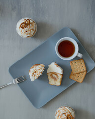 Sweet pastries decorated with caramel and salted pretzels