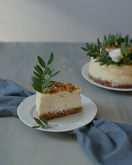 Delicious pastries decorated with flowers and greenery