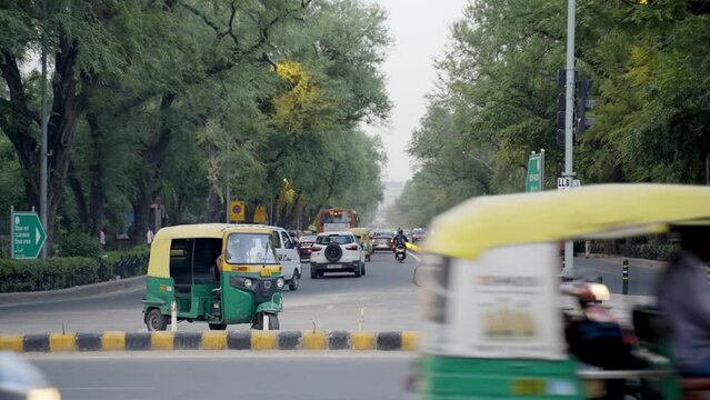 Public Transportations With Tuk-Tuks On Busy Street Of New Delhi City In India. Close up