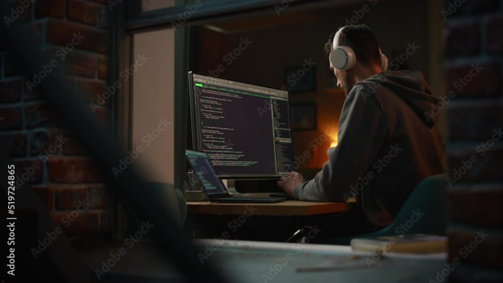 Fototapete Professional Software Developer Writing Code with Generic Programming Language. Development Interface Mockup. Information Technology Specialist. Remote Work Concept. View From Outdoors into Window.