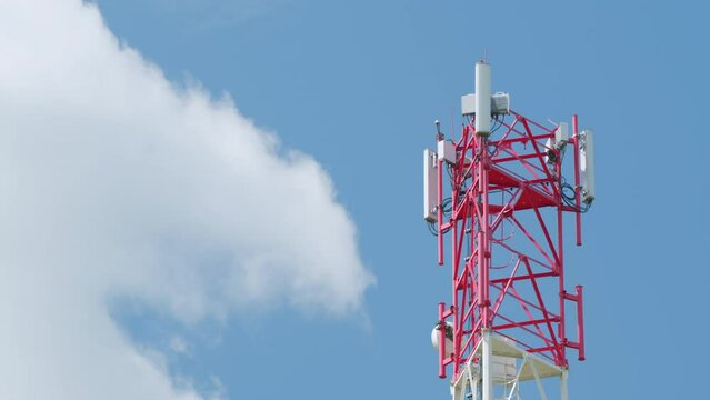 Telecom tower antenna and satellite transmits the signals of cellular 5g and 4g mobile signals. Communication. Time lapse.