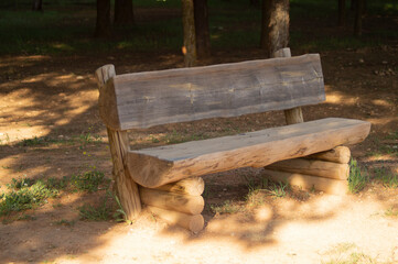Wooden bench in the natural environment for the rest of hikers, located in the viewpoint and...