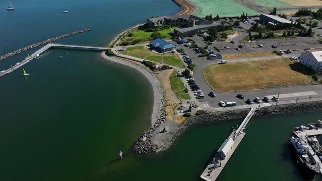 Orbiting drone perspective of Seafarers Memorial Park on a nice summer day in Anacortes, Washington.