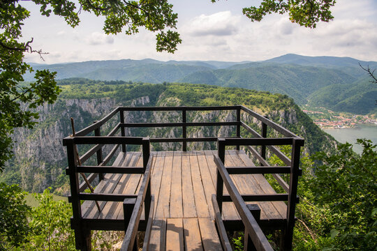 Wooden platform viewpoint Ploce, of The Iron gate of the Donau/Danube river, natural border between Serbia and Romania. Djerdap National Park (Djerdapska Klisura).  Beautiful Danube Gorges.