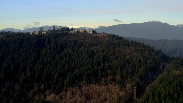 Aerial Of Simon Fraser University Over The Lush Burnaby Mountain In Canada. 