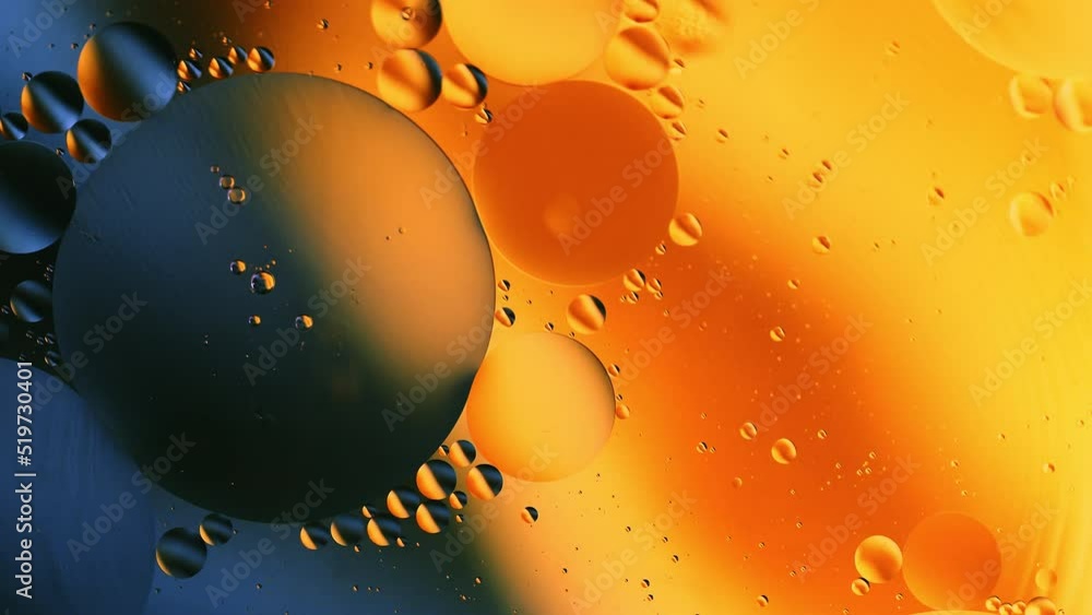 Poster real close up oil bubbles in water rotation with color gradient abstract mixing background.