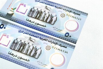 obverse sides of the new polymer commemorative 50 fifty Dirhams with Memorial to the martyrs of the...