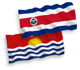 National vector fabric wave flags of Republic of Costa Rica and Republic of Kiribati isolated on white background. 1 to 2 proportion.