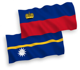 National vector fabric wave flags of Liechtenstein and Republic of Nauru isolated on white background. 1 to 2 proportion.