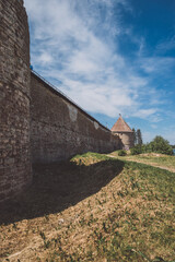 Fototapeta na wymiar Path next to the ancient fortress wall
