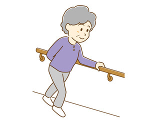 手すりにつかまって歩く高齢者女性