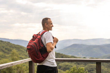 Hiker cheering elated and blissful after hiking