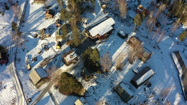 Hallingdal folk museum Nesbyen beautiful top-down sunrise aerial with golden light and long shadows