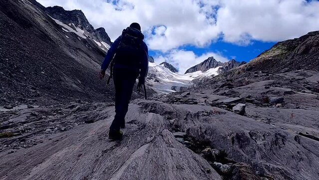 Hiking in Alps in Switzerland Mountain