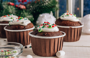 Chocolate Christmas cupcake with colored sugar topping