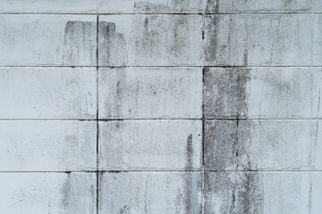 Gray Concrete block wall background and textured with dirty.
