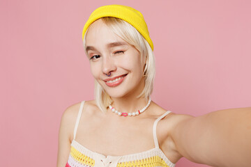 Close up young blond lesbian woman she wear knitted top yellow hat do selfie shot pov on mobile...
