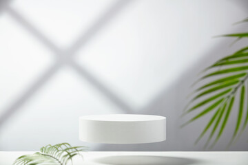 Flying empty white podium and palm leaves on white background. Mock up stand for product presentation. 3D Render. Minimal concept.