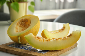 Sliced Ripe Yellow Melon on Table