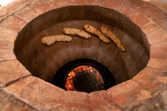 Georgian khachapuri in Megrelian baked in tandoor. Khachapuri with cheese, Georgian khachapuri megruli with cheese