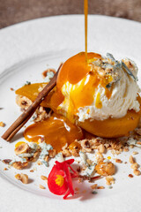 Baked pear with ice cream