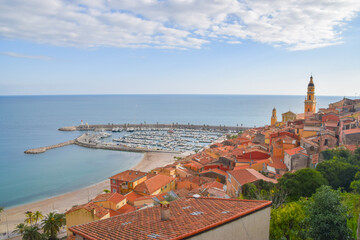 Aerial panoramic view of Menton Old Town, port and sea, South of France.