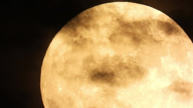 Mystic full moom moving along dark night with clouds passing in opposite direction, Time Lapse