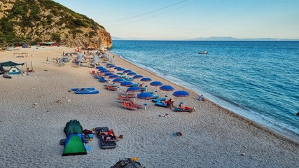 parasols and sunbeds on the beach in Albania