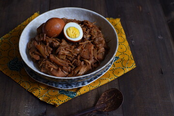 a plate of gudeg, traditional food from Yogyakarta, Indonesia