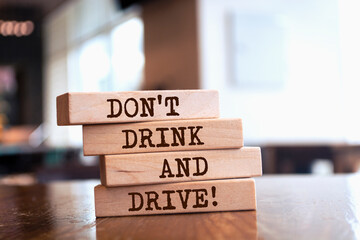 Wooden blocks with words 'Don't Drink And Drive'. 