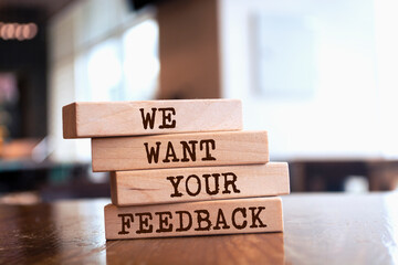 Wooden blocks with words 'We Want Your Feedback'. Business concept