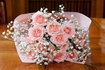 A bouquet of pink roses. Luxurious scarlet rose flower.