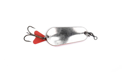 Fishing lure for catching predatory fish on a white background close-up view from above. Metal...