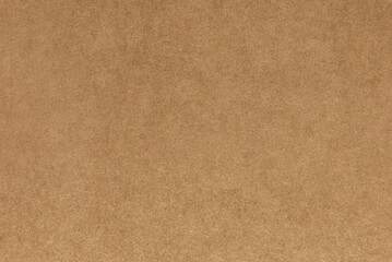 Pale old yellow paper background texture. Rough light brown kraft paper with pulp texture for background. High resolution texture backdrop.