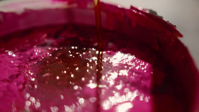 Close-up: paint is depicted with a solvent in the workshop of an artist - sculptor