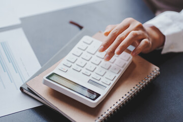 The financiers are calculating personal taxes for their customers.
