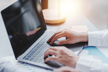 office girl's hands typing input data.